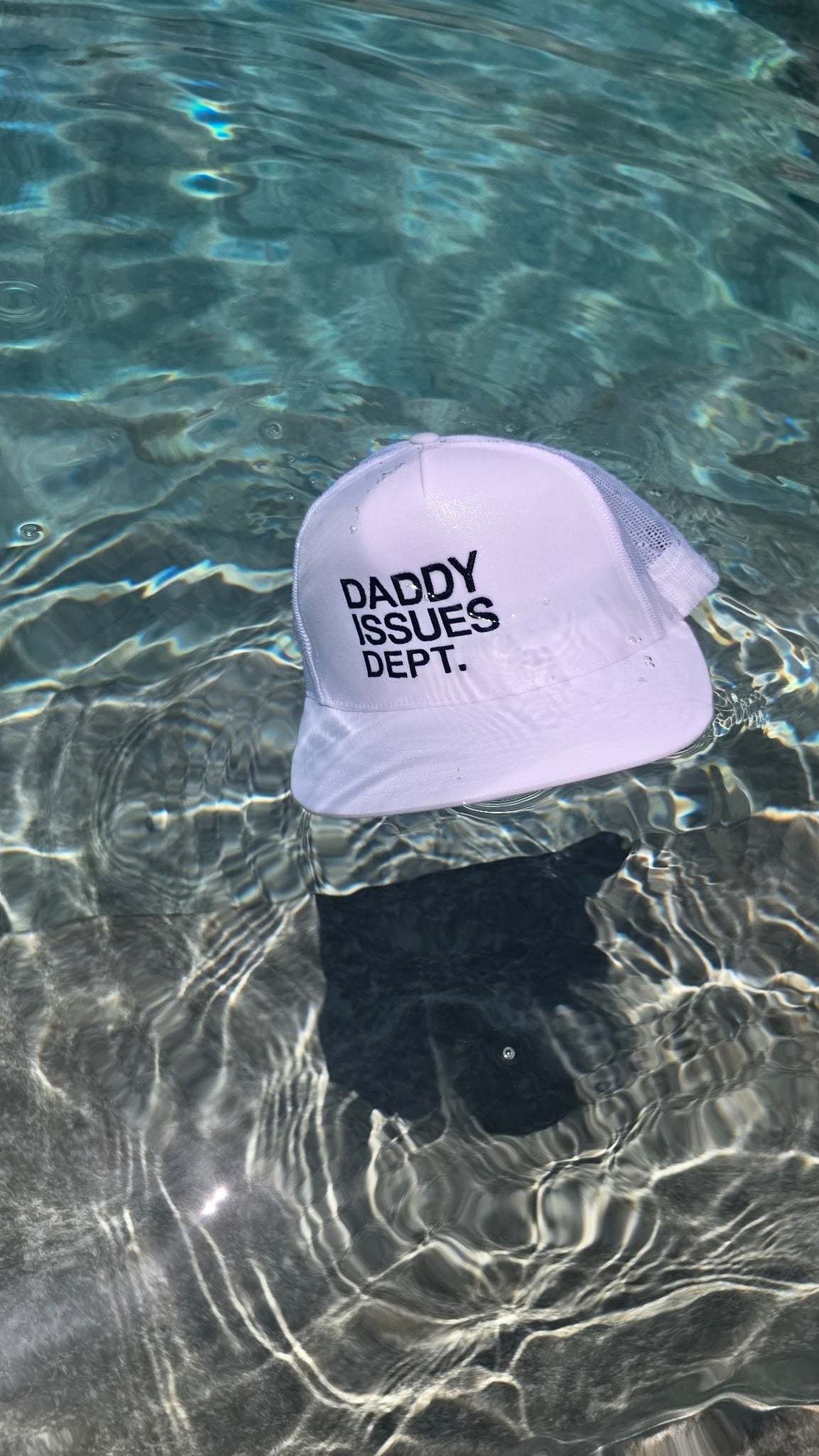 Daddy Issues Dept. cap by the pool
